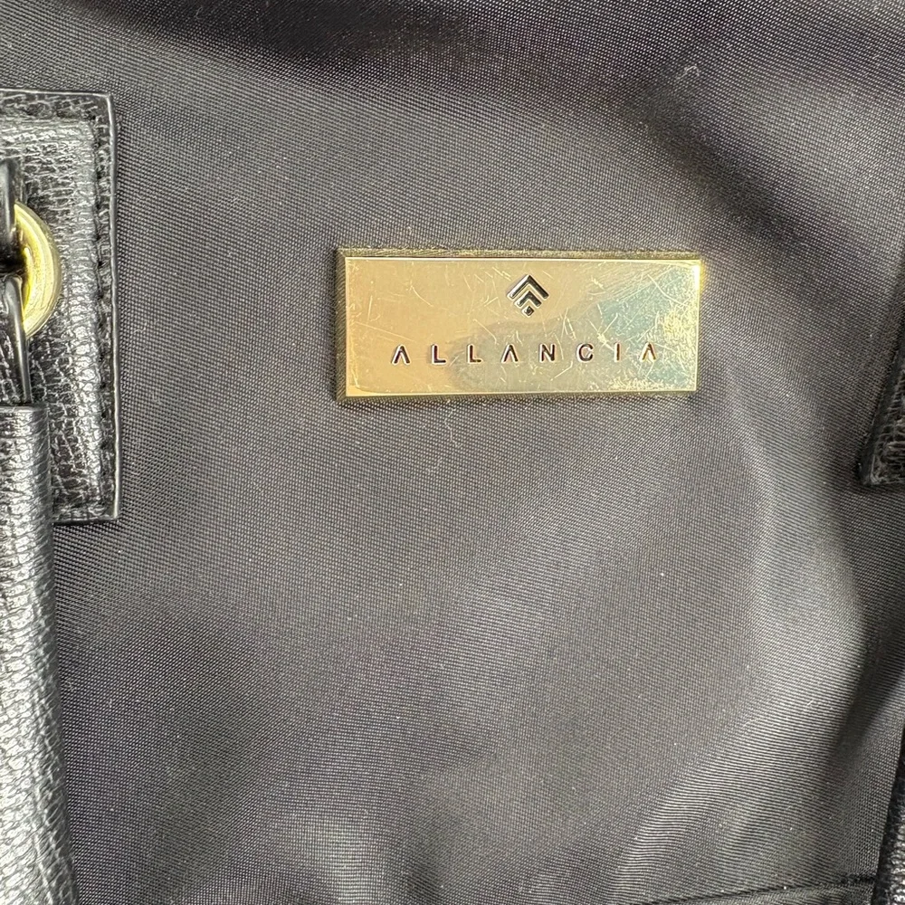 Allancia Black Dome Backpack with Leather Handles and Gold Hardware